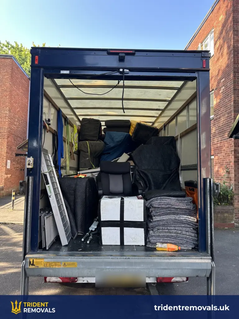 Luton van loaded with blanket-wrapped furniture on a Princes Park removal