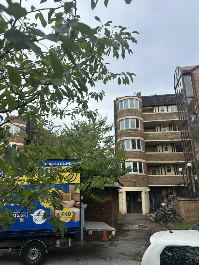 Flat Removal Edge Hill to Wavertree: Top Floor, No Lift Reliable Removals and House Clearance in Liverpool Removal van parked by the entrance of a top floor flat with no lift in Liverpool