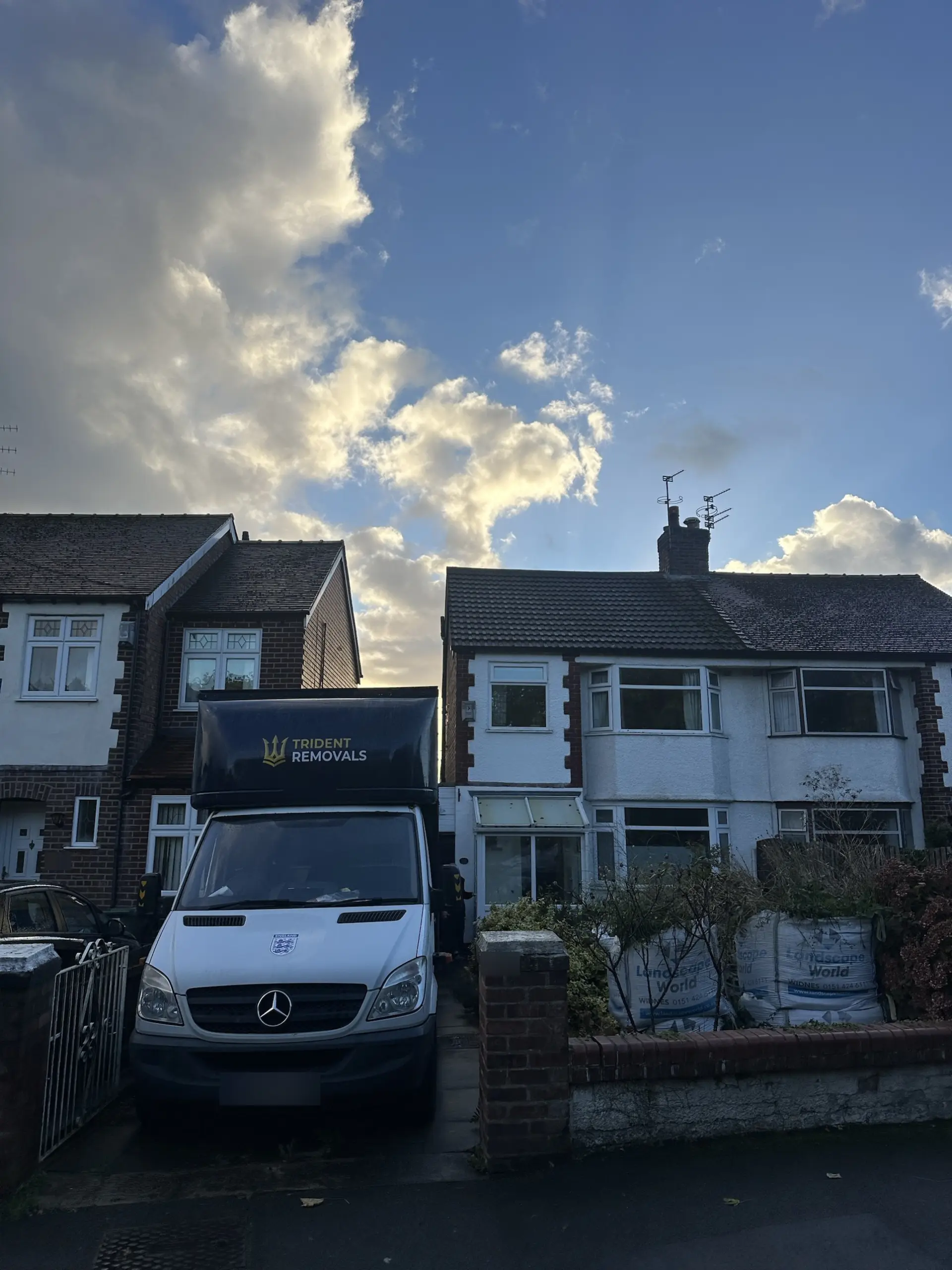 House Removal Bromborough to Wavertree: Cast Iron Fireplace and Upstairs Move Reliable Removals and House Clearance in Liverpool Trident Removals van at the pickup in Bromborough, Wirral
