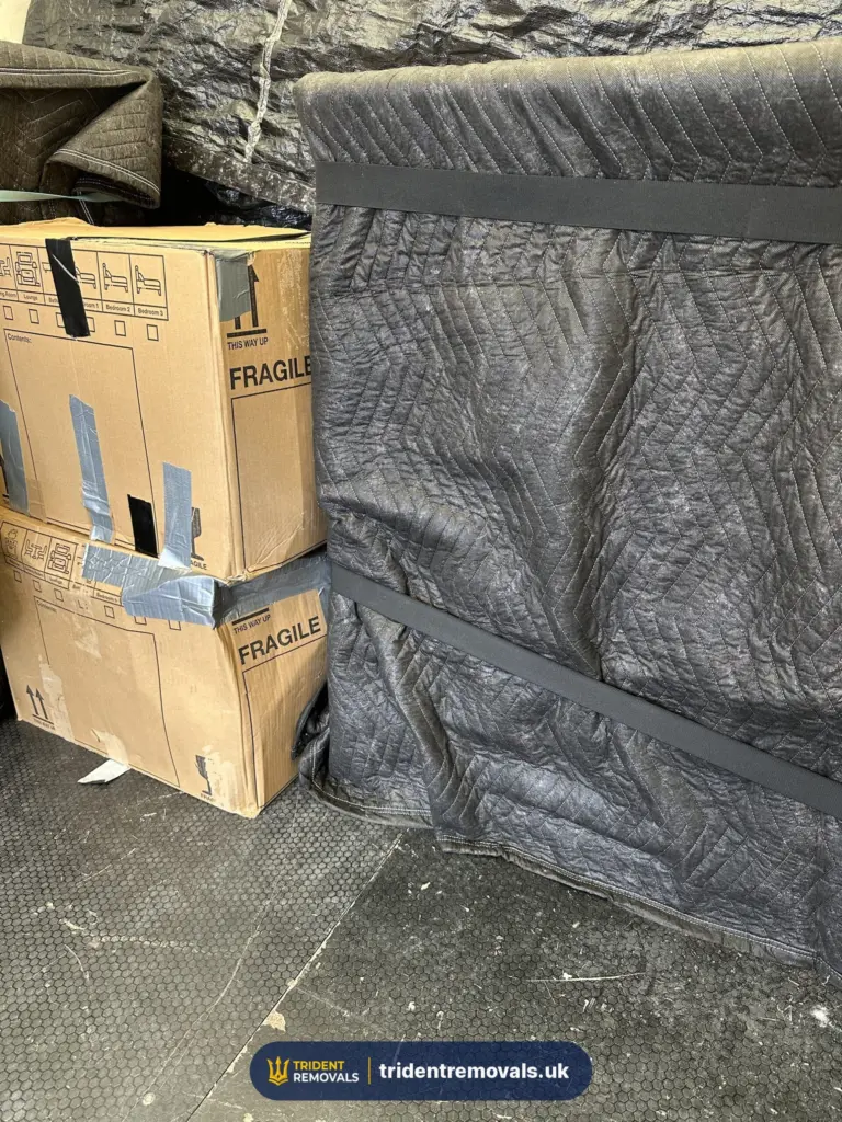 Fragile boxes wrapped furniture loaded removal van in Liverpool – Trident Removals