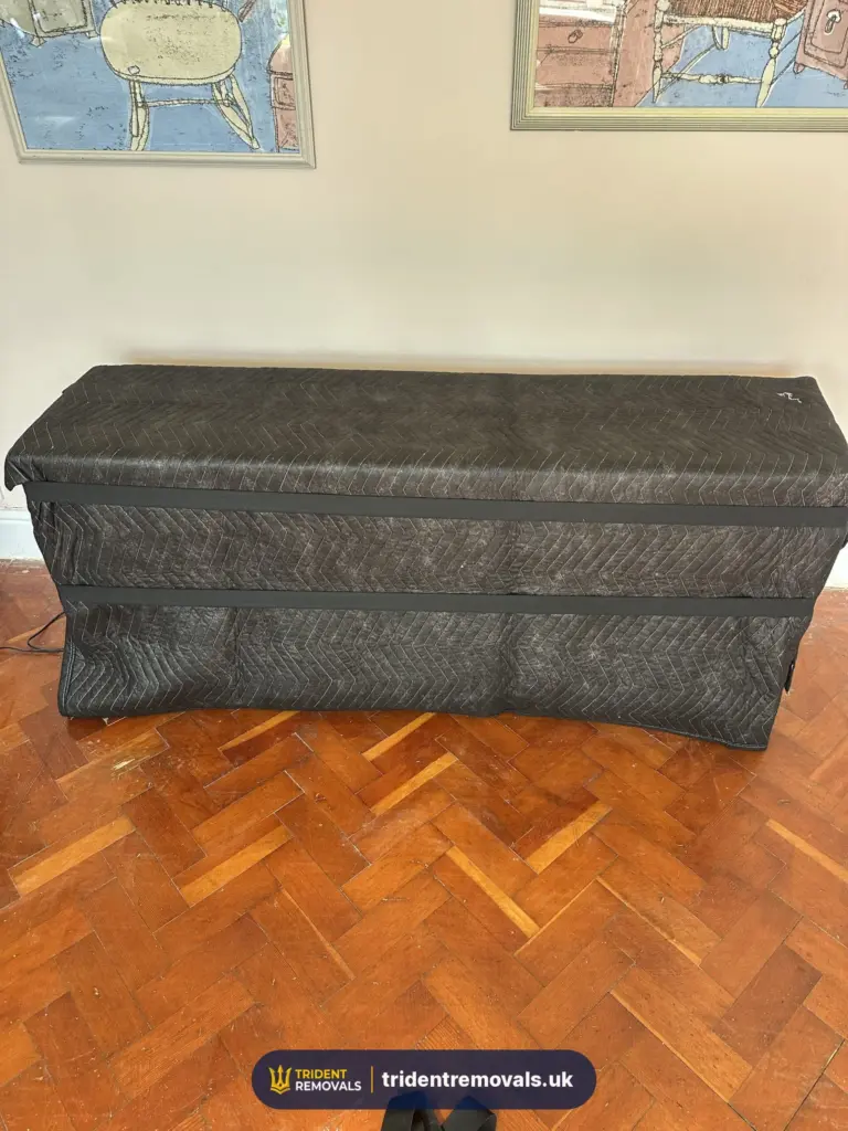 Furniture wrapped moving blankets packing service in Liverpool – Trident Removals