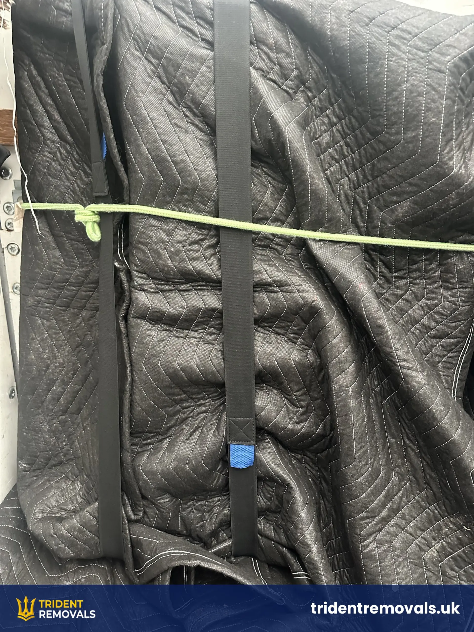 House Removal Bromborough to Wavertree: Cast Iron Fireplace and Upstairs Move Reliable Removals and House Clearance in Liverpool Blanket-wrapped furniture strapped for the journey from Wirral to Liverpool