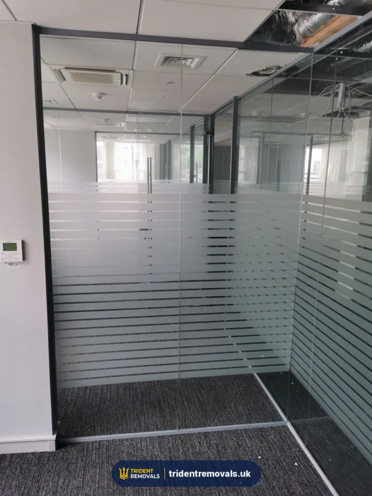House Clearance Reliable Removals and House Clearance in Liverpool Empty office with glass partitions after an office move in Liverpool
