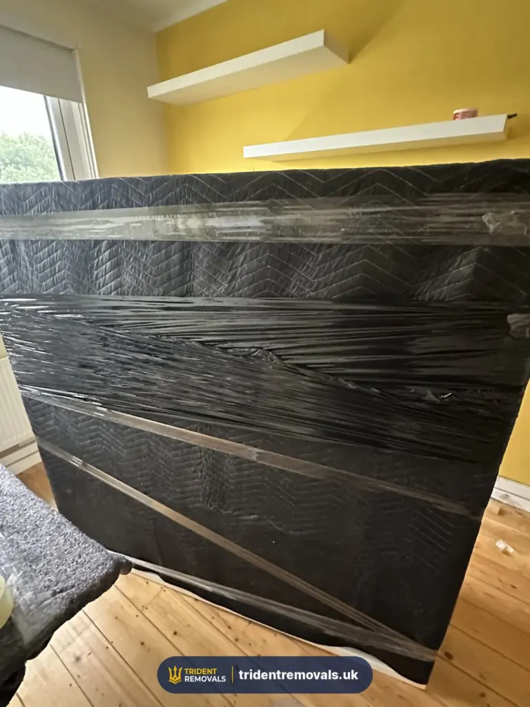 Wardrobe wrapped blankets stretch film packing in Liverpool – Trident Removals
