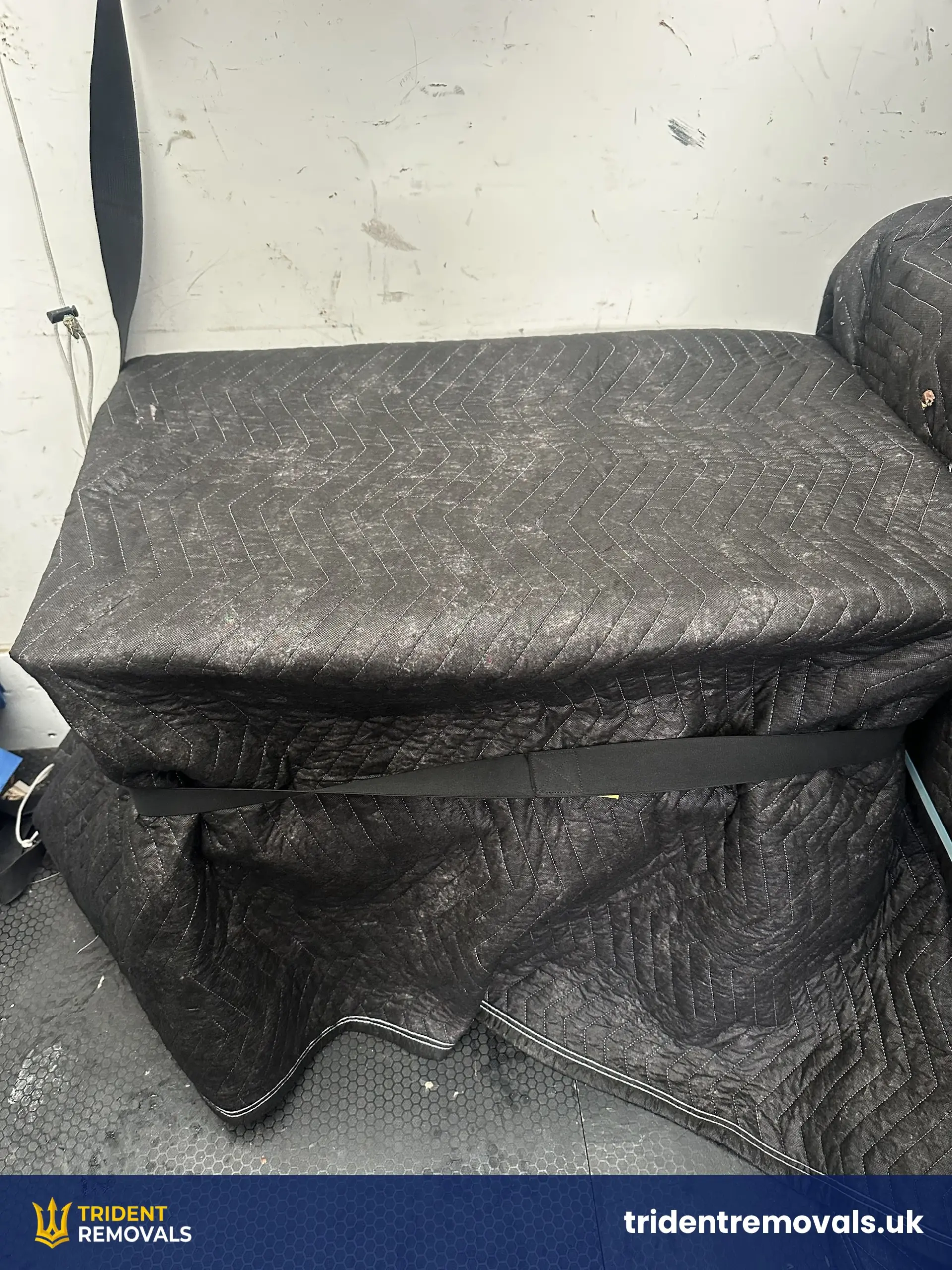 House Removal Bromborough to Wavertree: Cast Iron Fireplace and Upstairs Move Reliable Removals and House Clearance in Liverpool Furniture wrapped in moving blankets and strapped inside the removal van